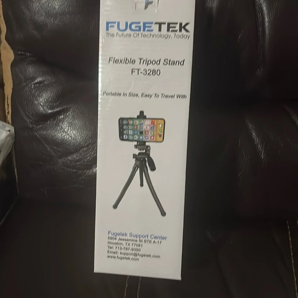 In the box brand new. Flexible tripod stand.
